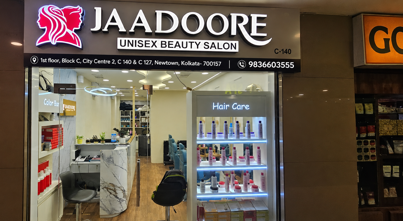 Jaadoore Unisex Beauty Salon storefront with glowing gold signage